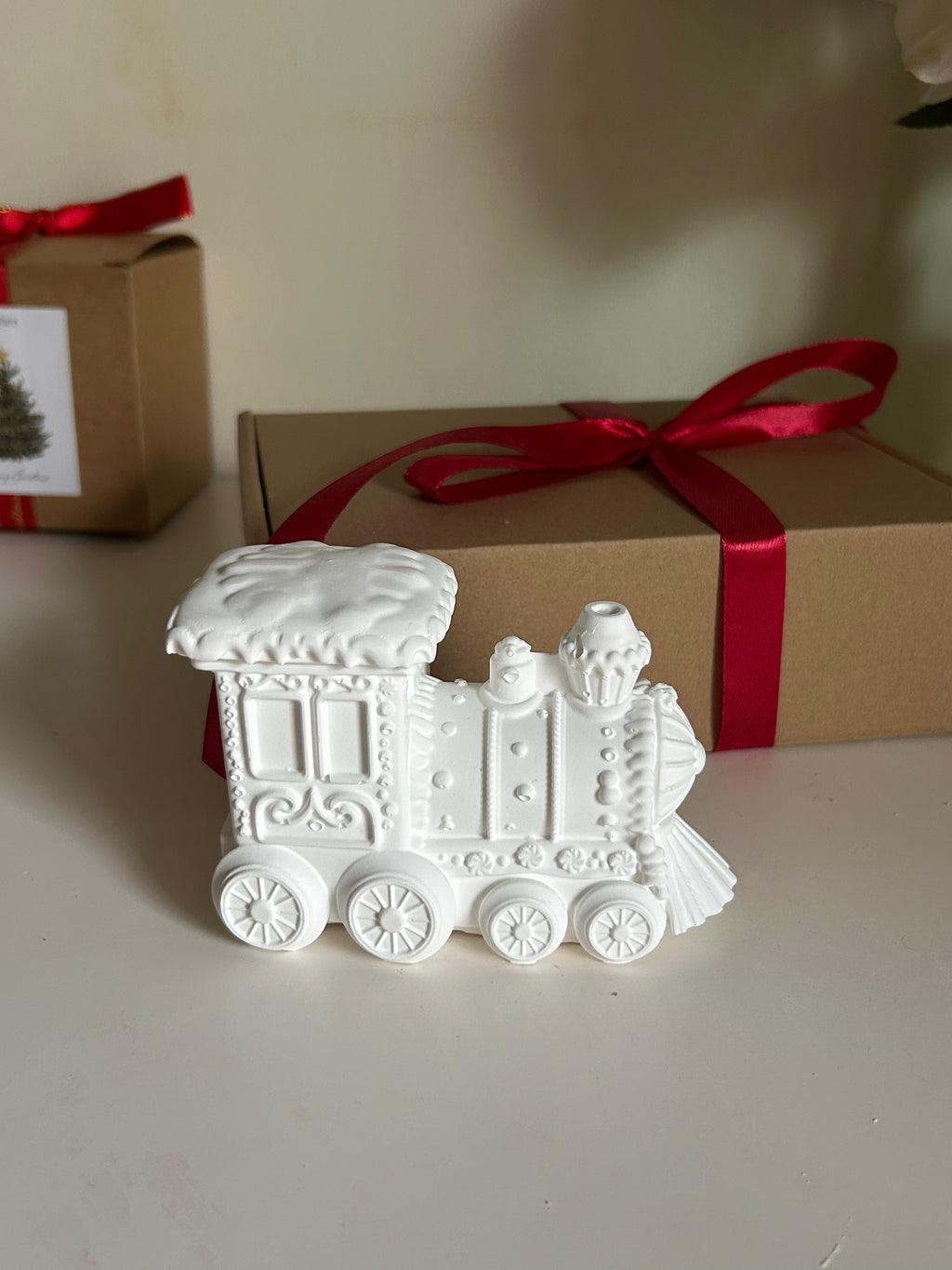 Ceramic train with a soy candle