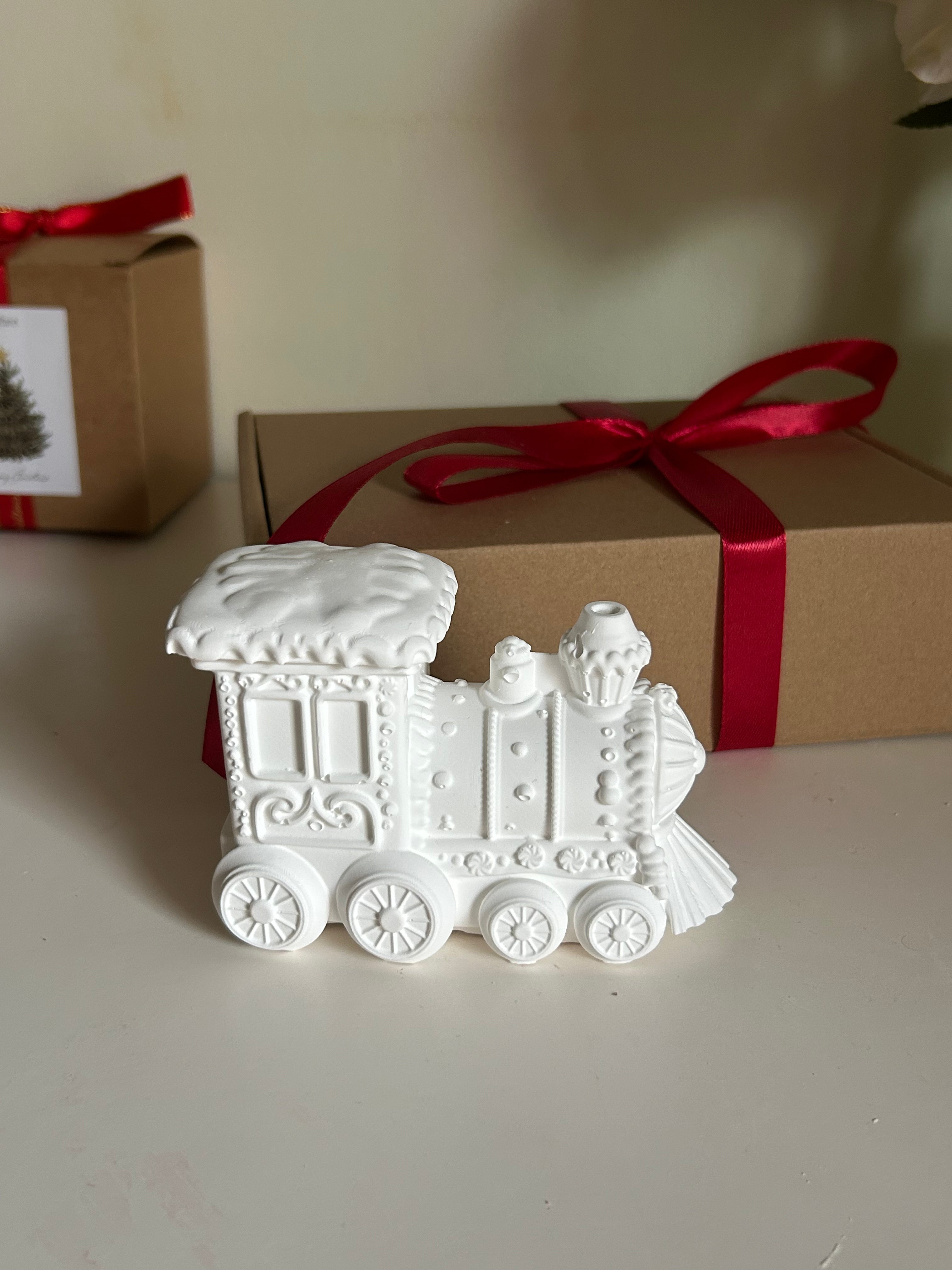 Ceramic train with a soy candle