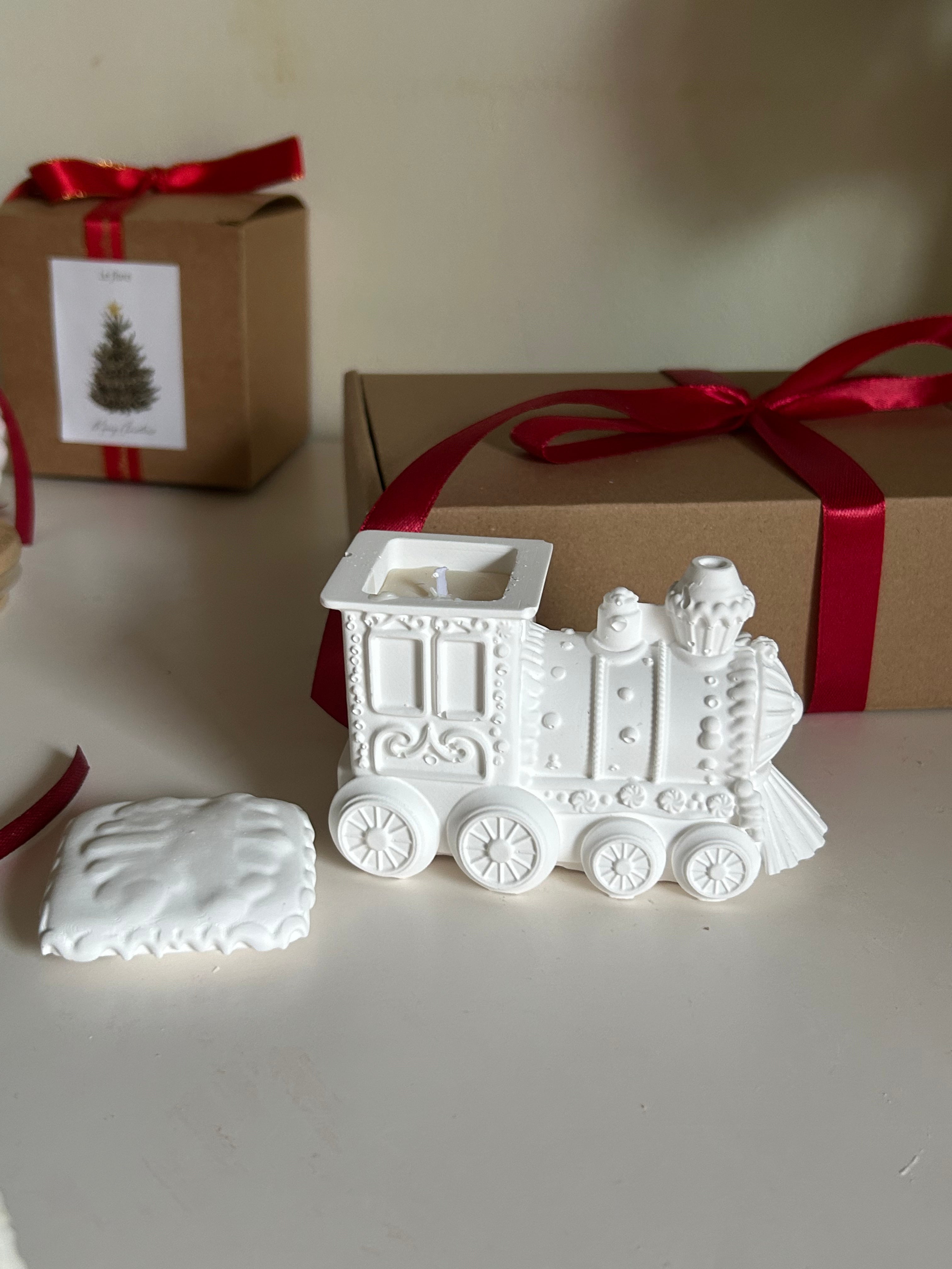 Ceramic train with a soy candle